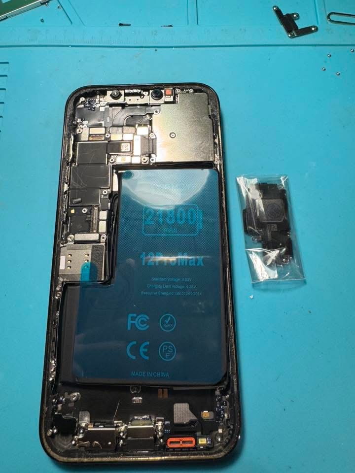 Opened iPhone 12 Pro Max with a new battery installed